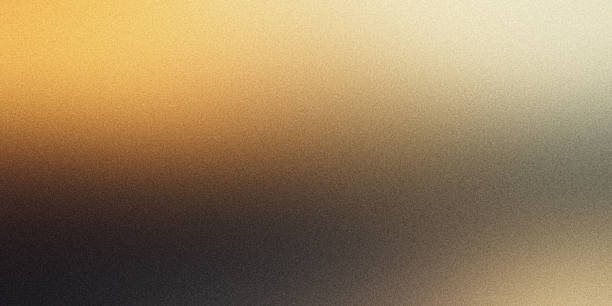 istock Grainy gradient background gray brown golden yellow glowing light dark noise texture banner poster backdrop design 2005431609