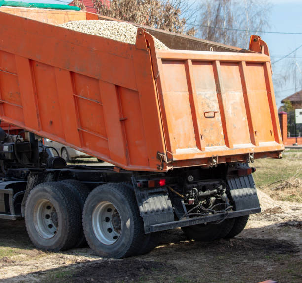 istock Truck pours rubble on the ground. 2005442156