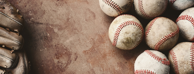Old grunge baseball background with vintage brown texture, copy space for sports banner