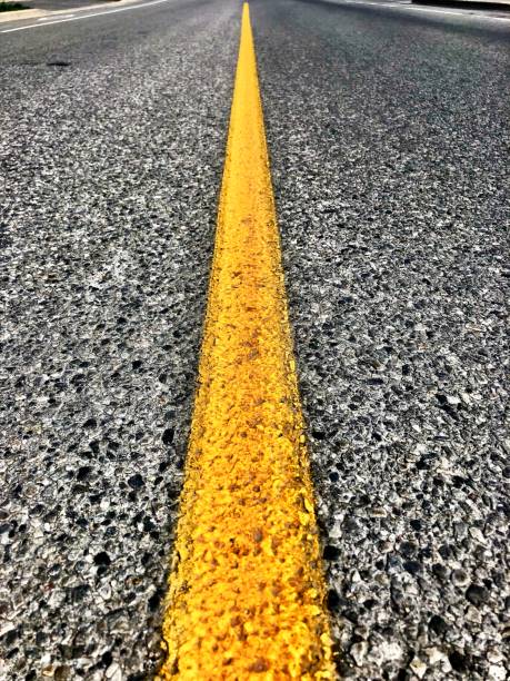 Low angle view of dividing line on highway in countryside