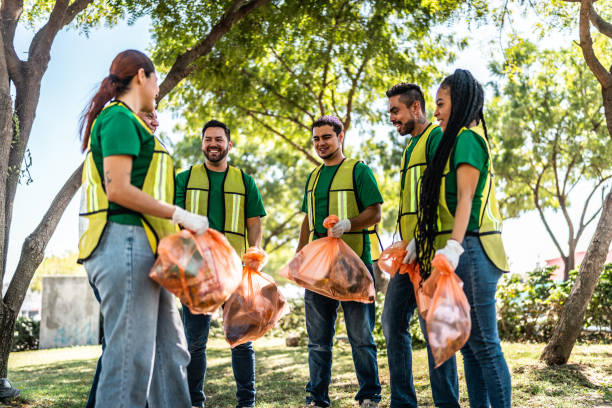 istock Recyclers talking after cleaning the public park 2005478877