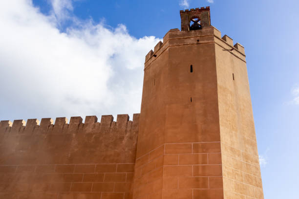 Espantaperros Tower: Sentinel of History in the Blue Sky.