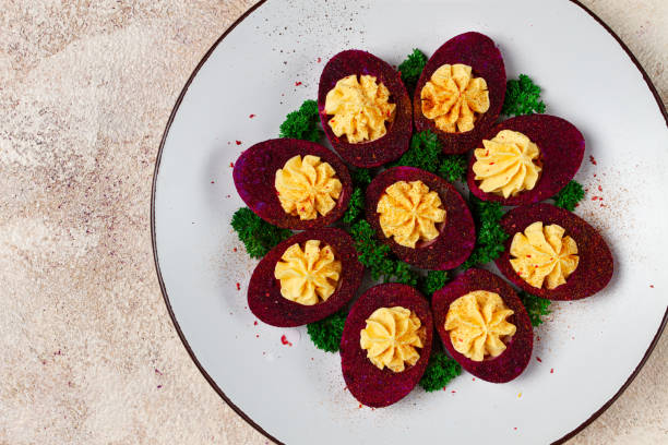 istock stuffed eggs, stained with beetroot juice, purple, pitaya powder, top view, top view, close-up, no people, 2005498844