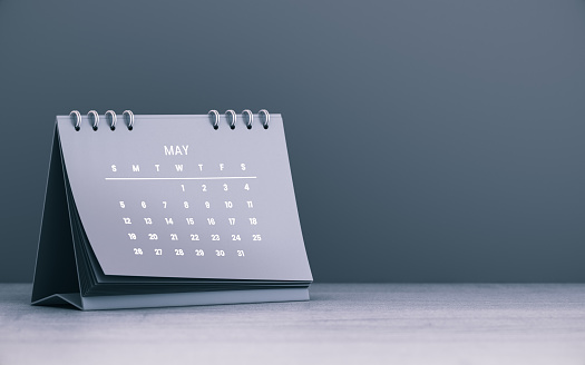 Monthly Set Desk Calendar 2022 template: 3D illustration on grey colored surface with large blank space for additional text. Horizontal composition. Set of 12 Months. Week starts on Monday. Stationery planner.