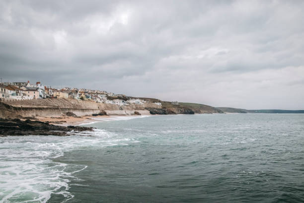 A scenic view of stormy beach in Porthleven, Cornwall, UK