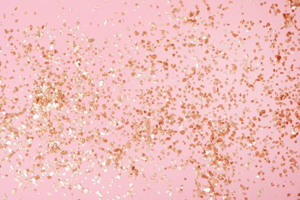 istock Golden sparkles on pink pastel trendy background. Festive backdrop for your projects. 2005518371