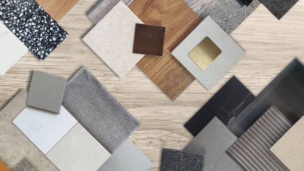 istock interior material samples contains panels and tiles. stylish interior moodboard including terrazzo, quartz, stone tiles, blue laminated, wooden flooring tiles, gold stainless placed on wooden table. 2005525249