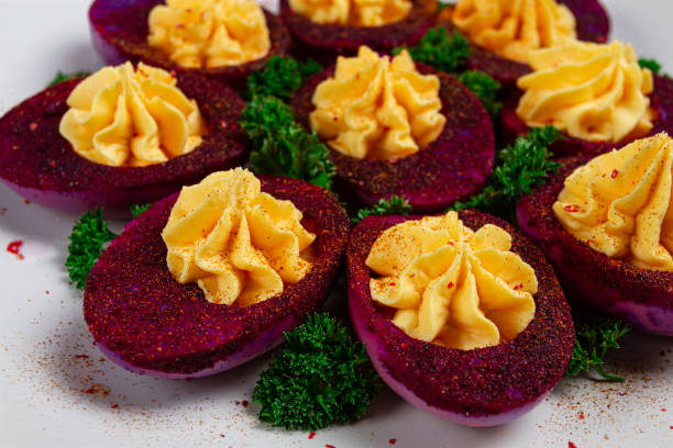 istock stuffed eggs, stained with beetroot juice, purple, pitaya powder, top view, top view, close-up, no people, 2005530457