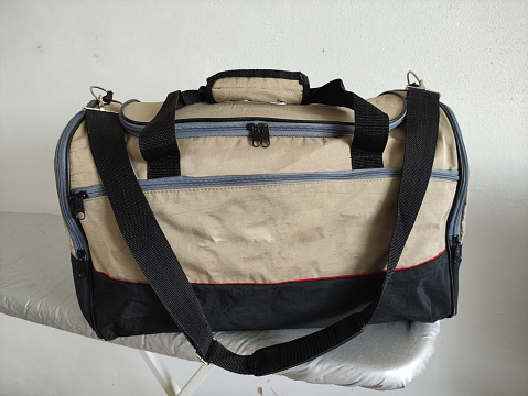 Duffel bag or travel bag at home