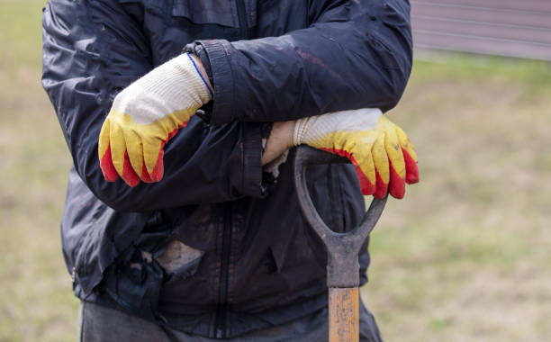 istock Close-up of male hands in protective construction gloves 2005542123