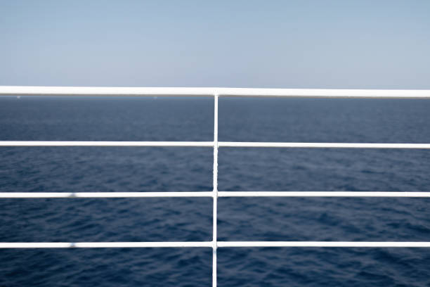 istock white railing on a ship overlooking the sea, Aegean Sea, Greece 2005554832
