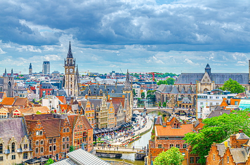 Ghent cityscape, aerial panoramic view of Ghent historical city centre with old traditional buildings on Lys Leie river embankment Grass Quay, Gent skyline horizon, panorama of Gent old town, Belgium
