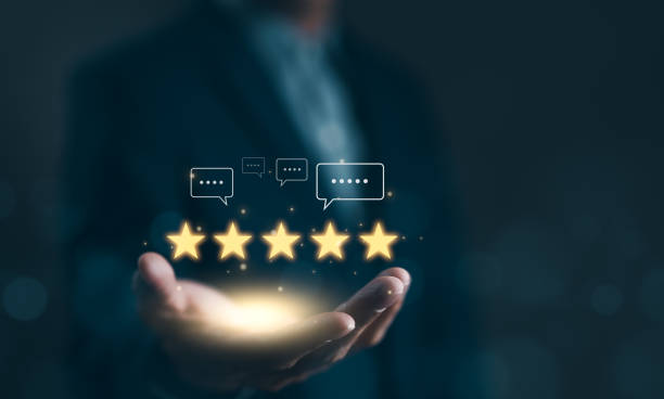 istock User feedback and review satisfaction, 5 star score, happy smile, Service experience rating online application, Evaluation of product service quality by customer. Customer satisfaction survey concept. 2005653438