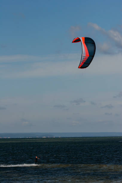 istock Kitesurfing on the lake on a sunny summer day 2005677677
