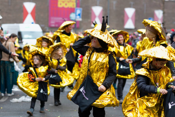 Cologne, Germany - February 11, 2024: On Carnival Sunday in Cologne, there are the traditional parades of schools and societies, Schull- un Veedelszöch, the participants are usually wearing self made costumes, here the group of the Kölner Domsingschule