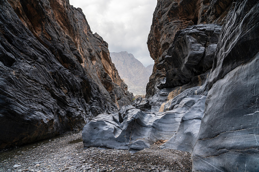 Wadi Bani Awf—one of Oman’s most challenging river gorges, one can swim in winding Snake Gorge.