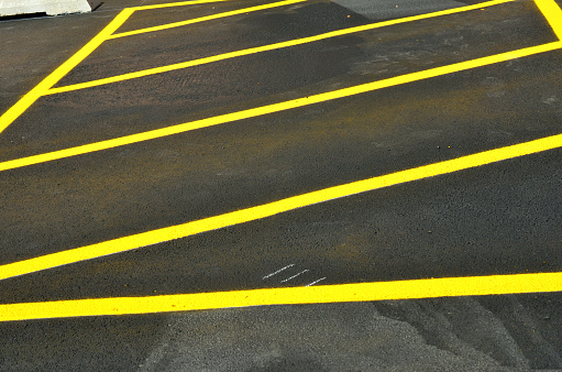 New yellow line on paving surface