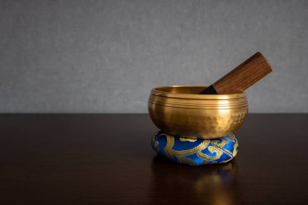 istock Tibetan singing bowl, striker and ring cushion with copy space 2005795914