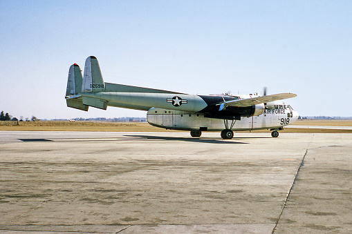 Fairchild C-119 Flying Boxcar military airplane taxiing for takeoff at Waterloo, Iowa, USA. Photographed in 1966.