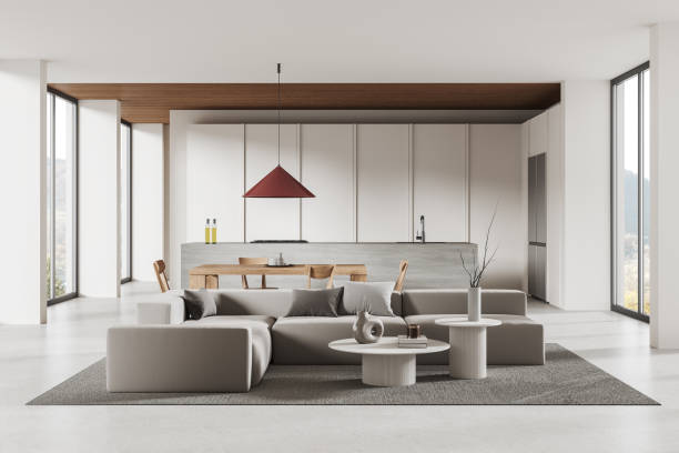 istock Stylish studio interior with relaxing and cooking space, panoramic window 2005861779