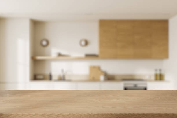 istock Product display desk in white kitchen with shelves 2005862008