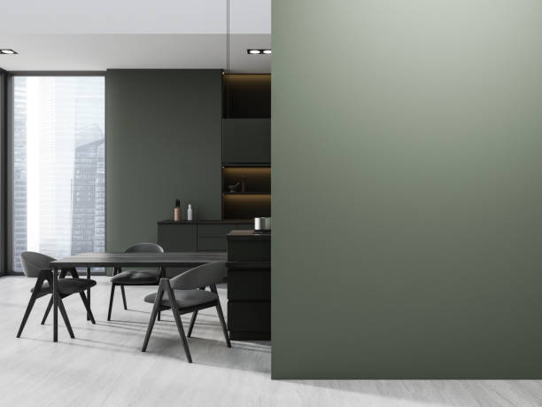 istock Stylish home kitchen interior with dinner table and cooking space. Mock up wall 2005862130