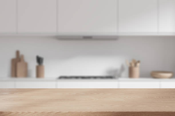 istock Product display desk in white kitchen with cooker 2005862475