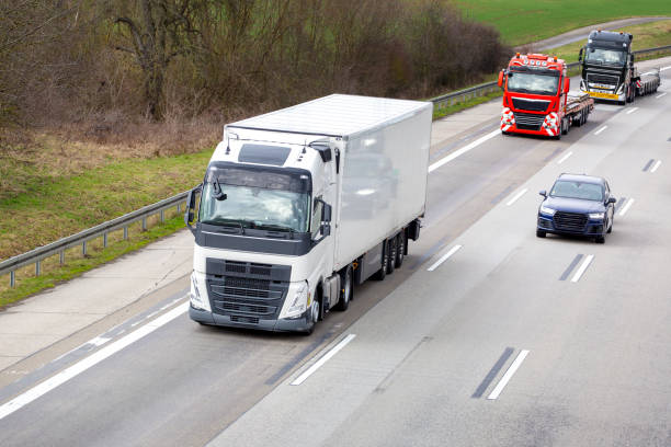 istock Trucks and dense traffic on German highway 2005863011