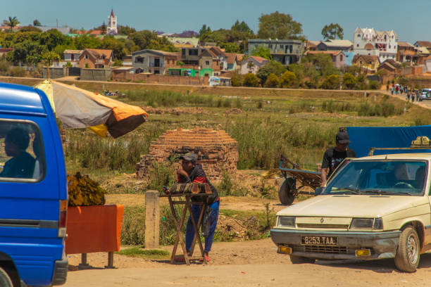 Antananarivo, Madagascar. 07 oktober 2023. street of Antananarivo. People suffer of poverty slow development country. townspeople rushing about their business. Vendors selling street food and fruits