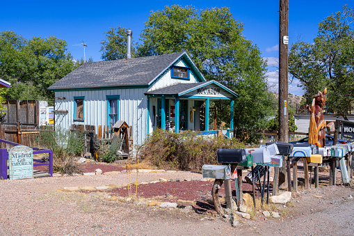 Santa Fe, New Mexico, USA - September 14, 2023: Colourful house in Madrid, New Mexico along the Turquoise Trail. Most of the houses in Madrid are a tourist attraction, housing a gift shop.