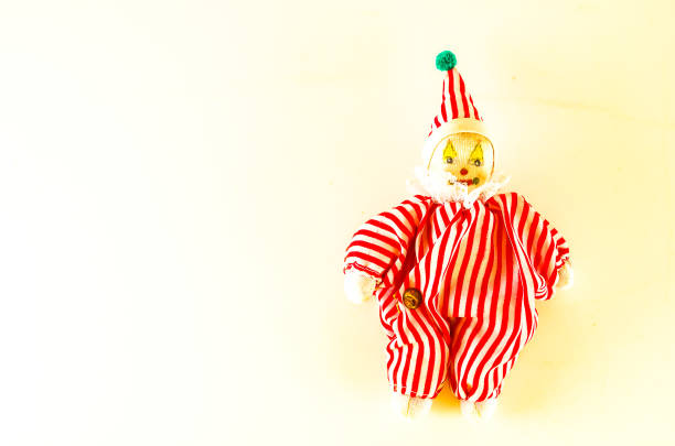 istock Pierrot toy doll on white background 2005881850