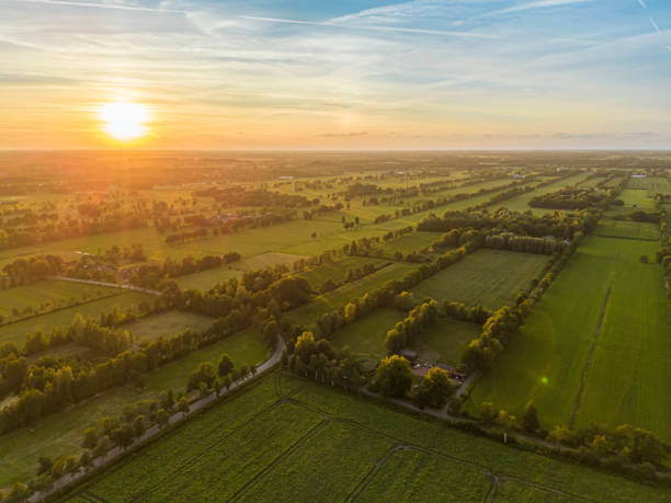 istock High angle view of dutch landscape against sky during sunset 2005980694