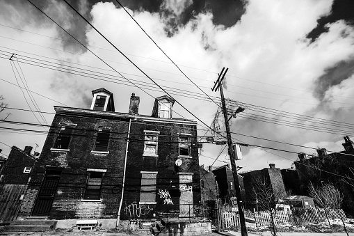 Pittsburgh, Pennsylvania, USA - Some abandoned townhouses in Uptown district.