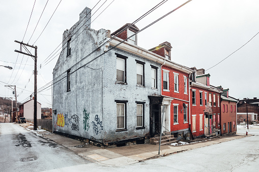 Pittsburgh, Pennsylvania, USA - Some abandoned townhouses standing in Uptown district