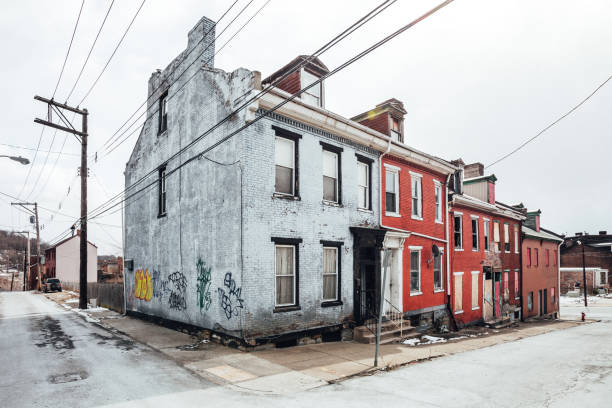 Uptown neighborhood - Pittsburgh, PA Pittsburgh, Pennsylvania, USA - Some abandoned townhouses standing in Uptown district run down neighborhood stock pictures, royalty-free photos & images
