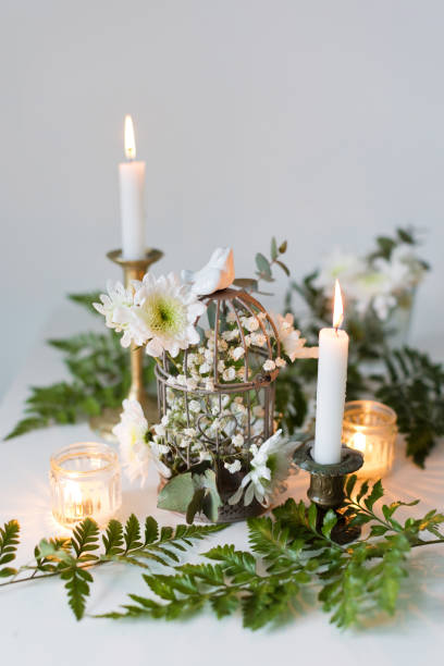 istock Beautiful decoration bird cage and flowers 2006036604