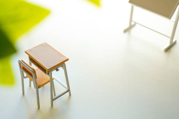 Image of a new semester with classroom blackboard and desk