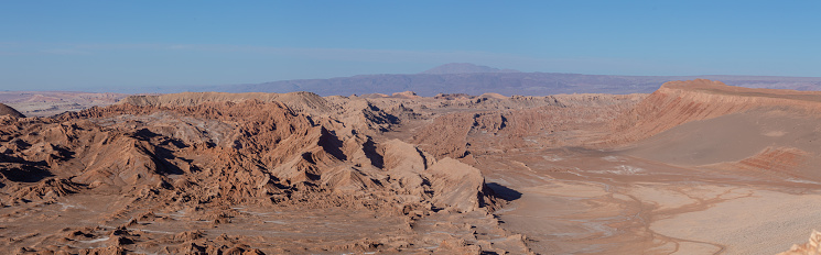 Panorama of the red rock and salt formations of the Valle de la Luna, Valley of the Moon, in the Atacama Desert