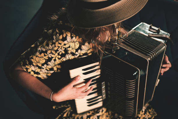 istock Woman playing the accordion. 2006078788
