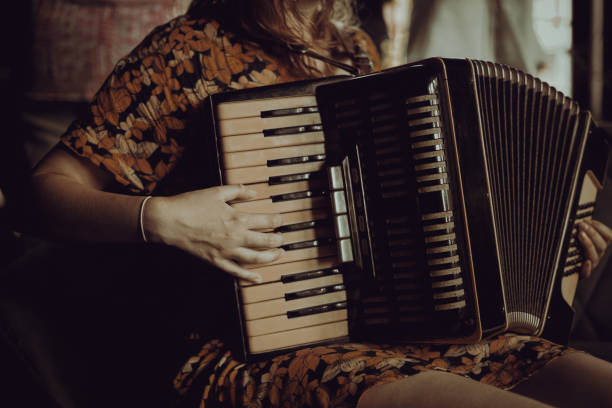istock Woman playing the accordion. 2006078789
