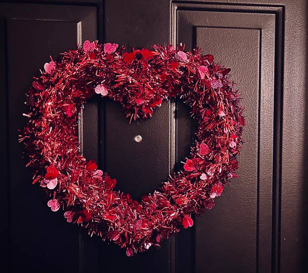 istock Red Glitter Heart Wreath on Door 2006081937