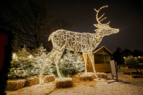 istock Christmas decorations. Toy deer decorated with garlands. 2006113272