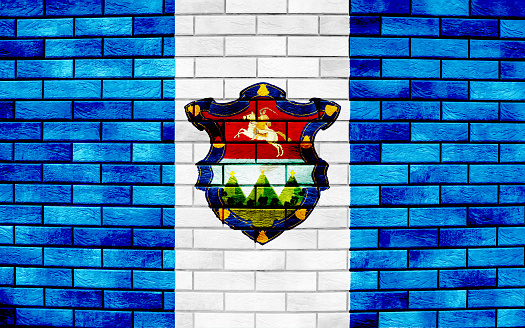 Flag and coat of arms of Republic of Guatemala on a textured background. Concept collage.