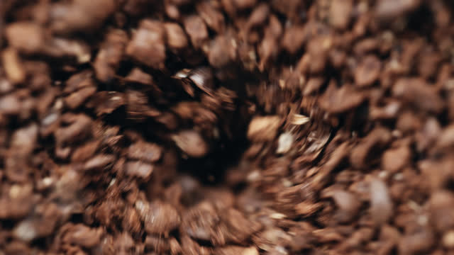 SLO MO Extreme Closeup Shot of Grinding Coffee Slow Motion Spinning