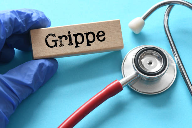 istock Grippe word on a wooden block next to a stethoscope. 2006155649
