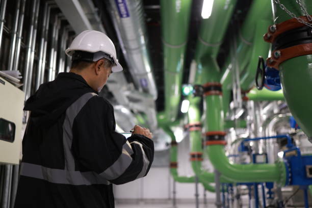istock The male engineer  is working on a Cooling system pipeline  with a tablet 2006177237
