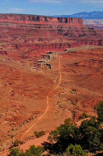 The Shafer Trail road cutting through harsh canyon country, as seen from the Shafer Trail Viewpoint, Island in the Sky, Canyonlands National Park, Moab, Utah, Southwest USA.