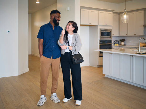 istock New Home Buyers in a Home 2006257076