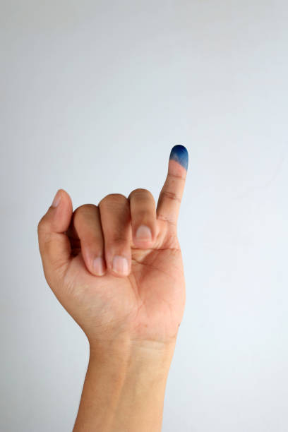 female arms and hands on blue background