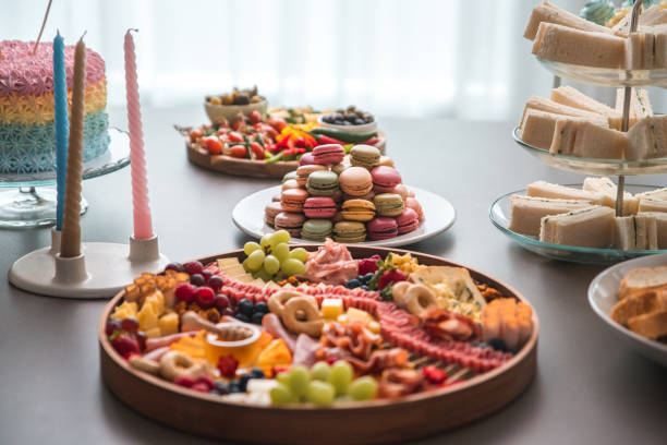 istock Baby Shower Feast Featuring Pastel Cake and Elegant Snacks 2006312086